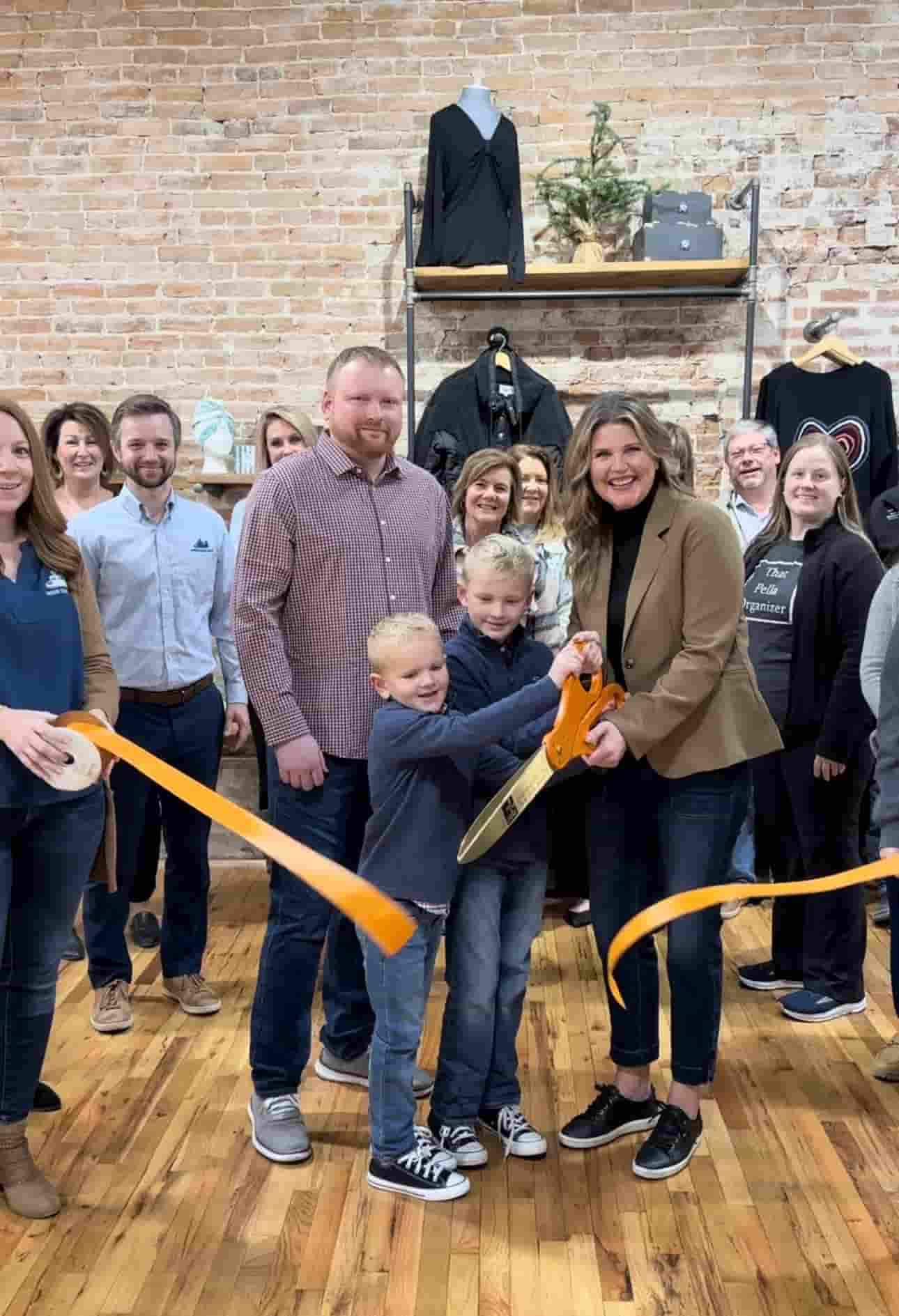 Ribbon Cutting for the Funky Zebras Pella